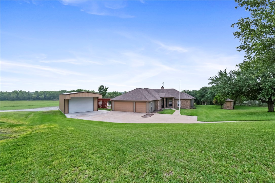 173 David Sandia, TX 78383 - Photo 3 of 40 Lakefront home with a 3 car garage and a 24 x 30 s