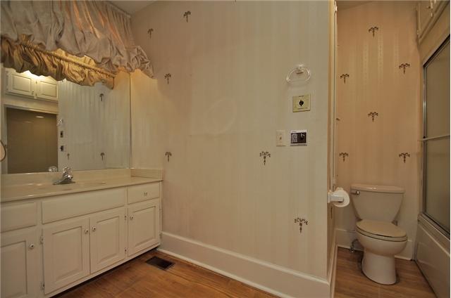 311 North Garner Street Springfield, TN 37172 - Photo 12 of 20 One of 2 full baths on main floor. Wood floors and a large vanity.