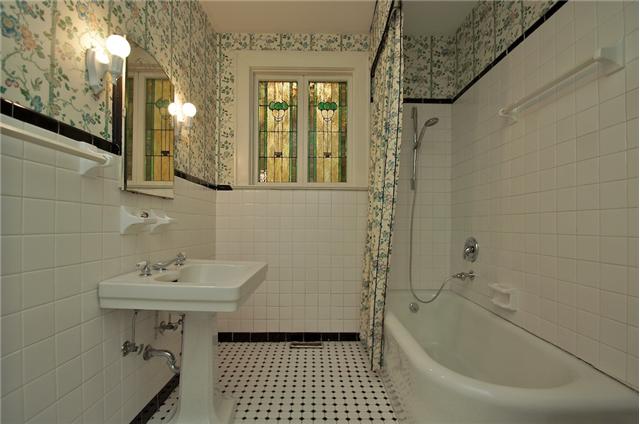 311 North Garner Street Springfield, TN 37172 - Photo 13 of 20 2nd full bath on main floor. Beautiful stained glass window and ceramic tile.