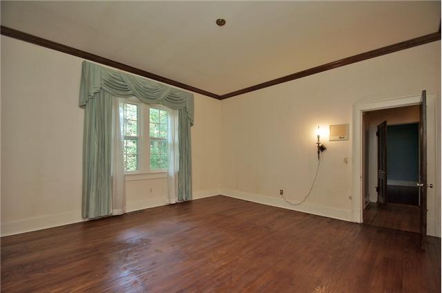 311 North Garner Street Springfield, TN 37172 - Photo 10 of 20 Downstairs bedroom - one of 2 master size bedrooms on main floor. Hardwood floors and large windows