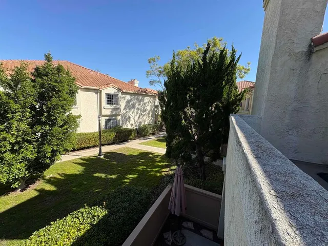 a view of a back yard of the house