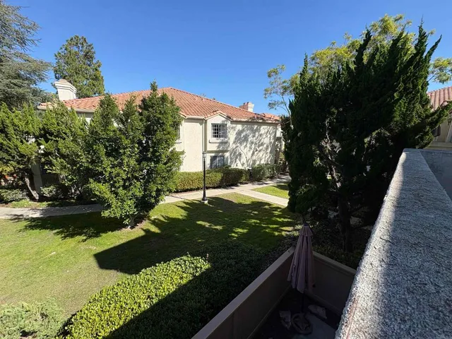 a view of a house with a street
