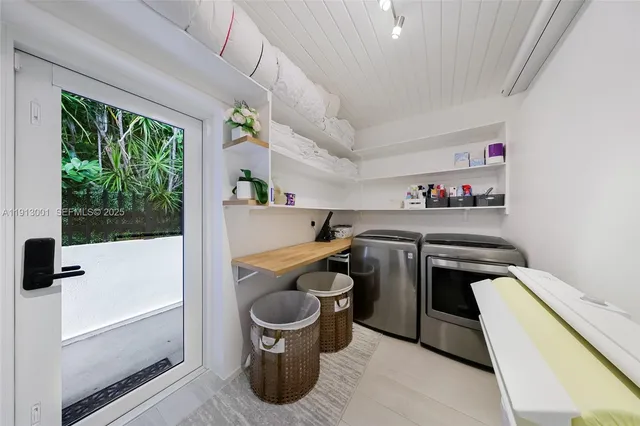 a kitchen with a stove and a refrigerator