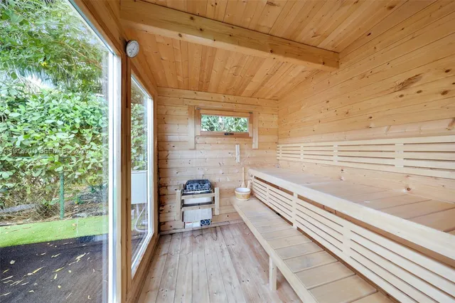 a view of balcony with wooden floor