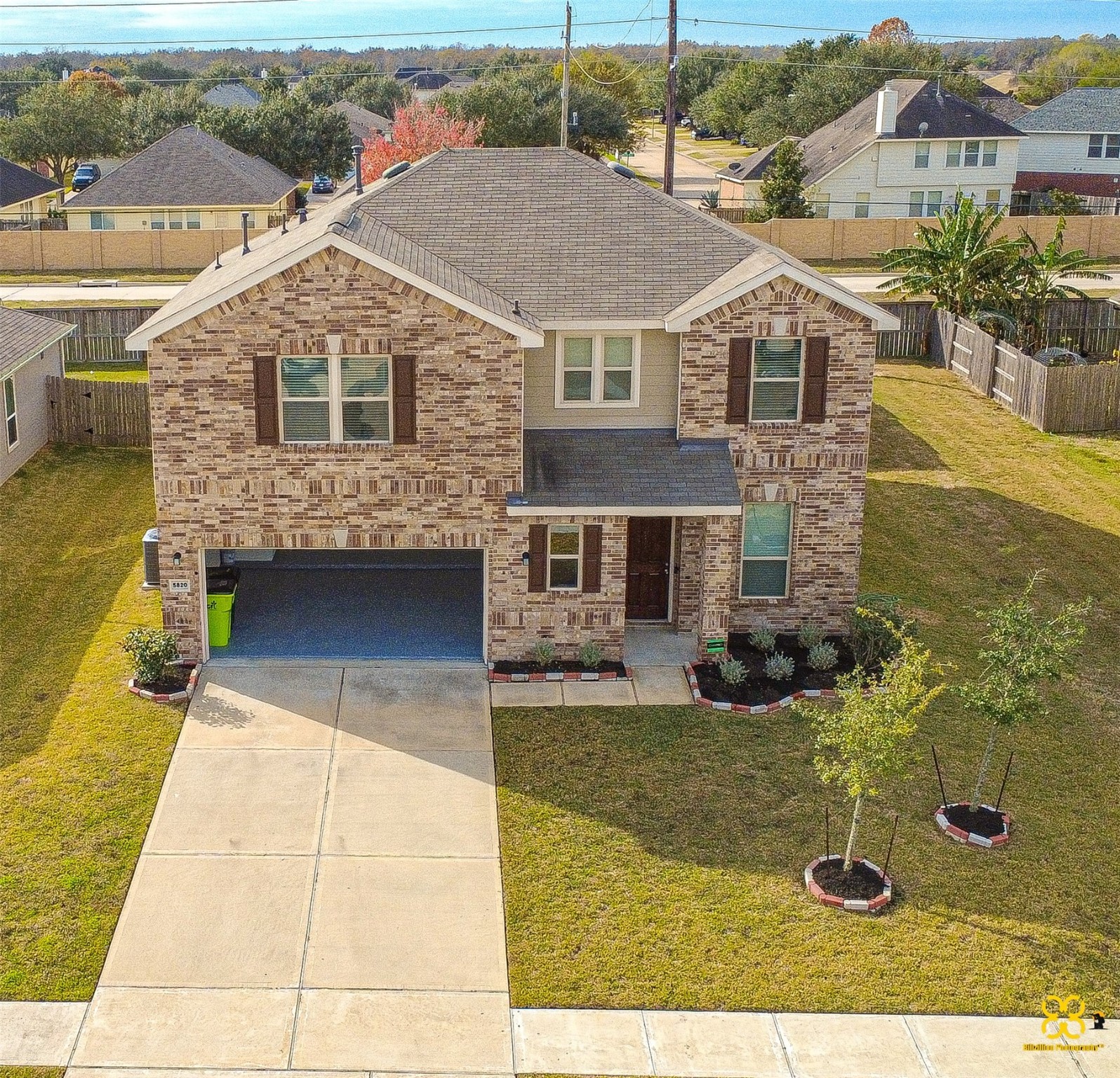 5820 Bluebonnet Lane Rosenberg, TX 77469 - Photo 4 of 43 This photo shows house with a neatly maintained front yard, a driveway leading to a Two car garage, and a covered entryway. The property is fenced.
