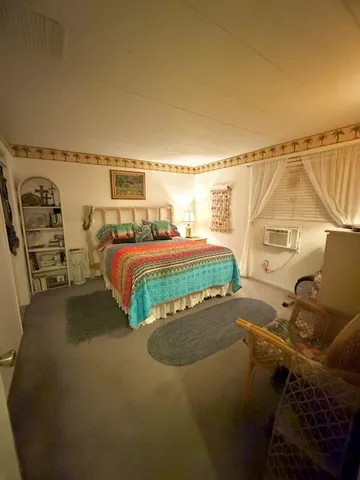 a bedroom with a bed and a walk in closet