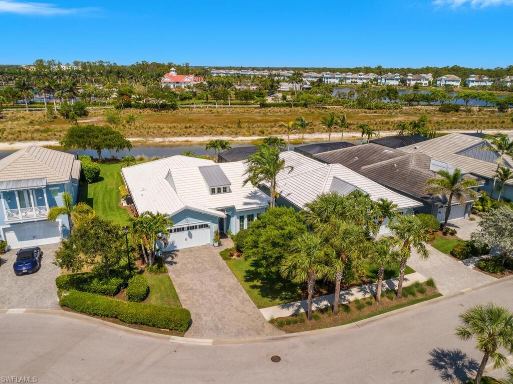 6478 Warwick Avenue Naples, FL 34113 - Photo 14 of 47 an aerial view of residential houses with outdoor space and ocean view