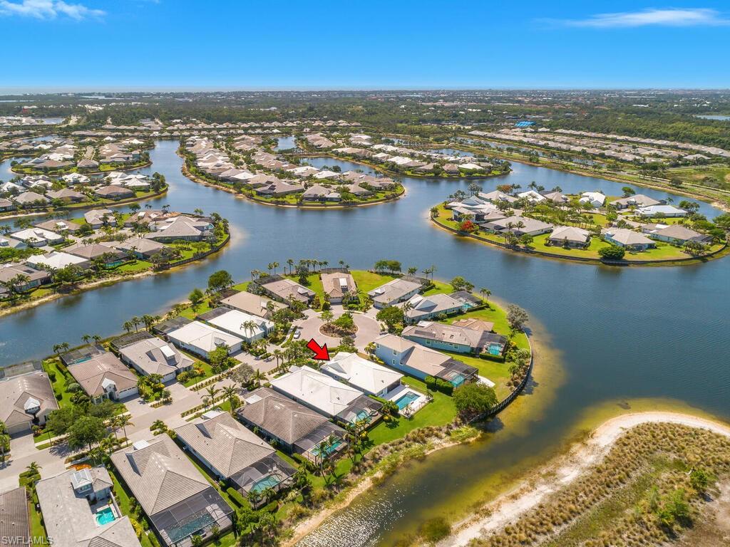 6478 Warwick Avenue Naples, FL 34113 - Photo 3 of 47 an aerial view of residential building with outdoor space and ocean view