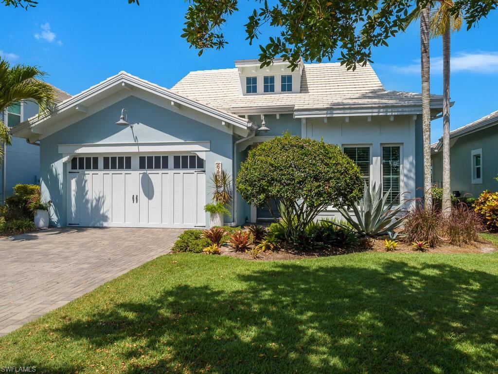 6478 Warwick Avenue Naples, FL 34113 - Photo 6 of 47 a view of a house with garden