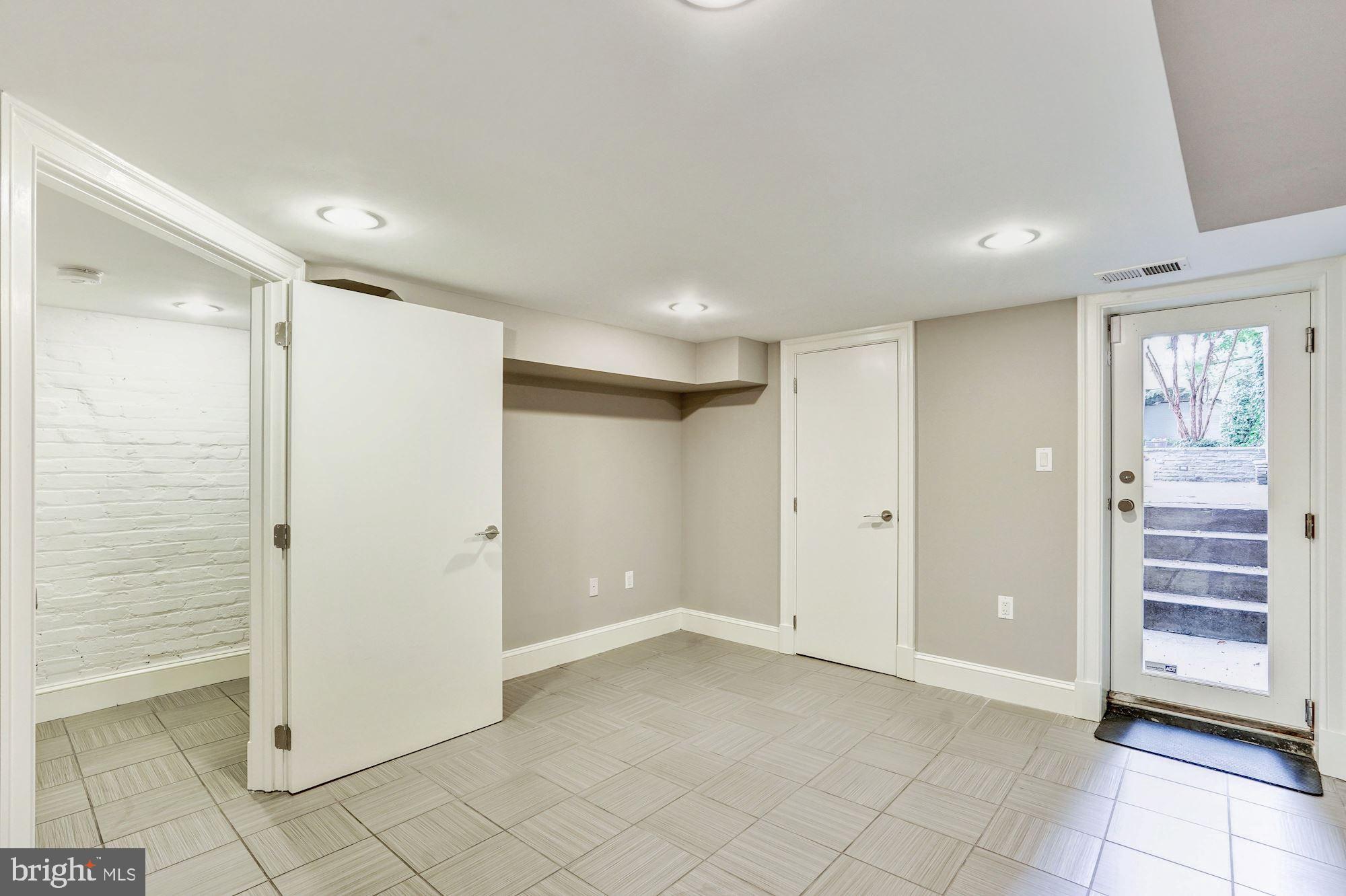 1333 East Capitol Street Southeast Washington, DC 20003 - Photo 32 of 43 Bedroom 4 on LL w/ walk out access to yard