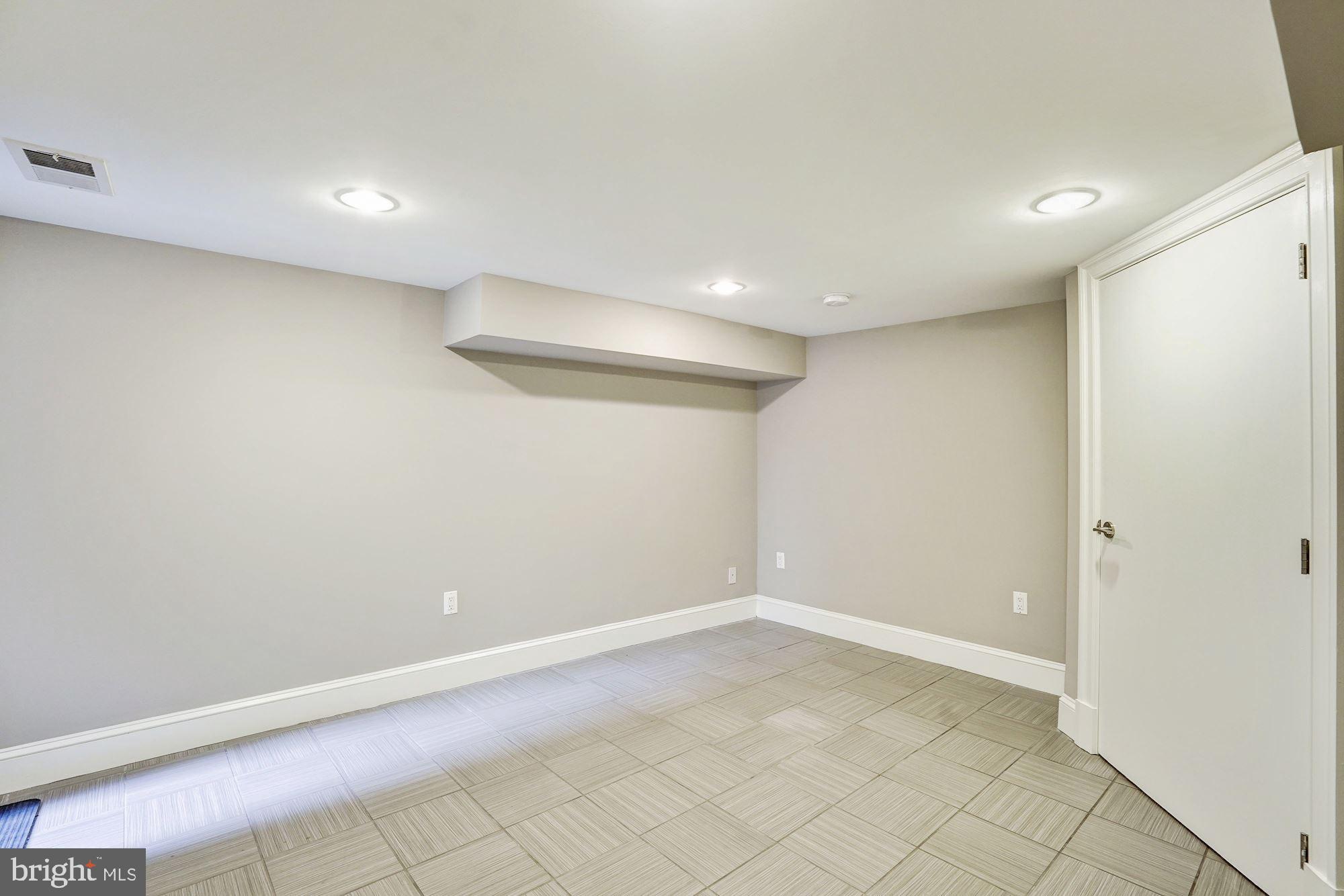 1333 East Capitol Street Southeast Washington, DC 20003 - Photo 33 of 43 Bedroom 4 on LL w/ walk out access to yard