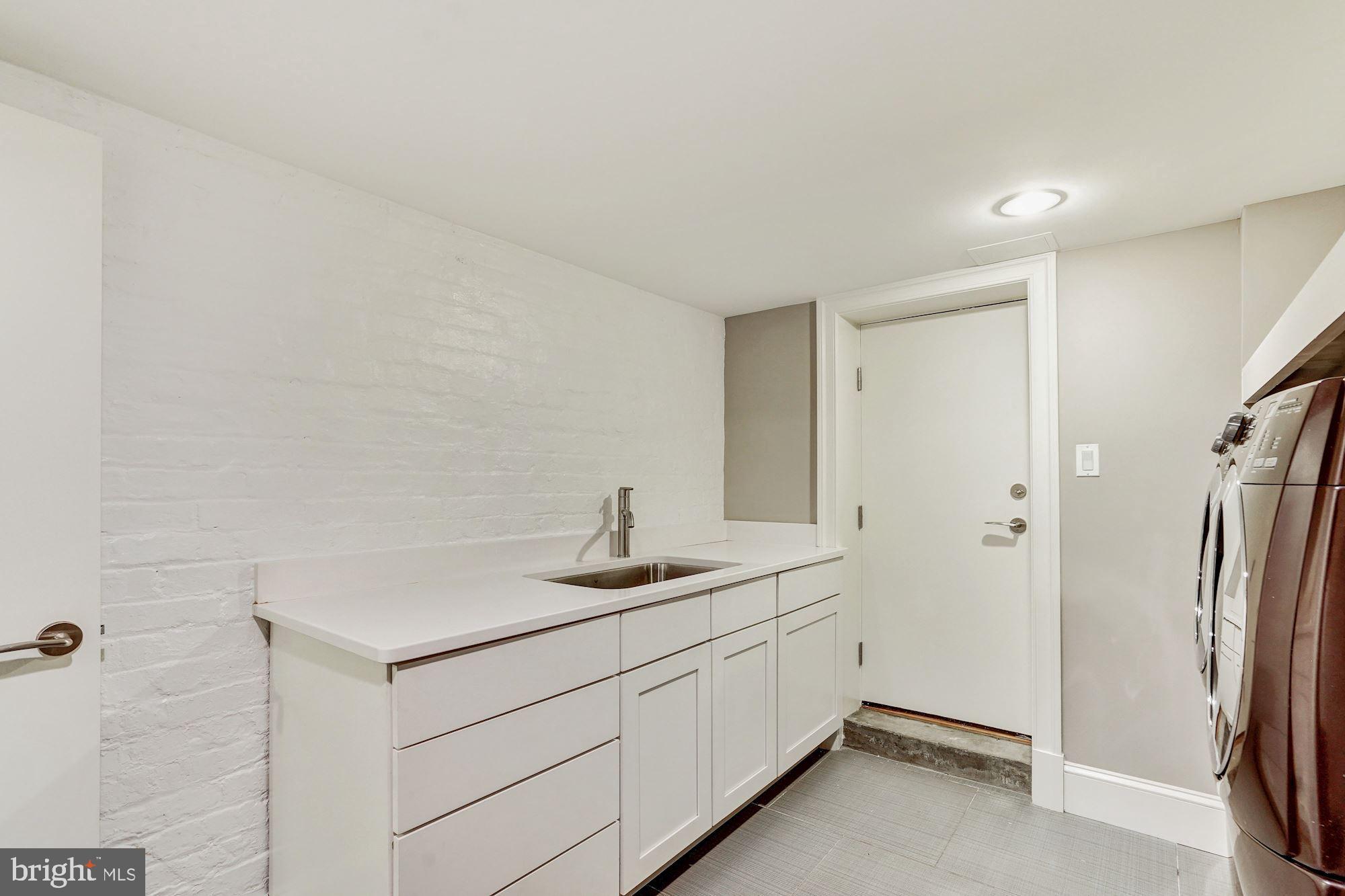 1333 East Capitol Street Southeast Washington, DC 20003 - Photo 36 of 43 Access to storage area off of laundry room