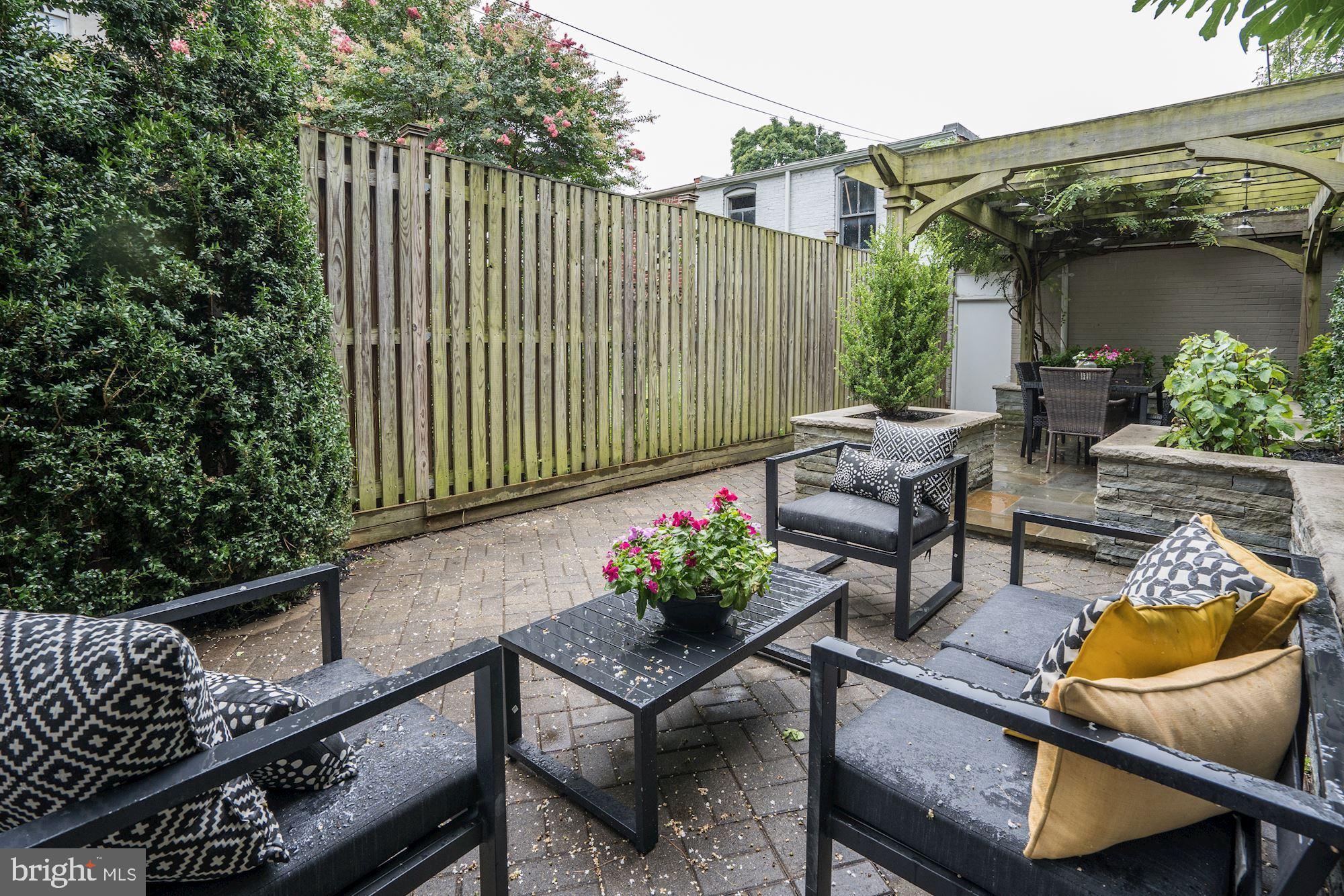 1333 East Capitol Street Southeast Washington, DC 20003 - Photo 39 of 43 One of two seating areas in the rear of the home