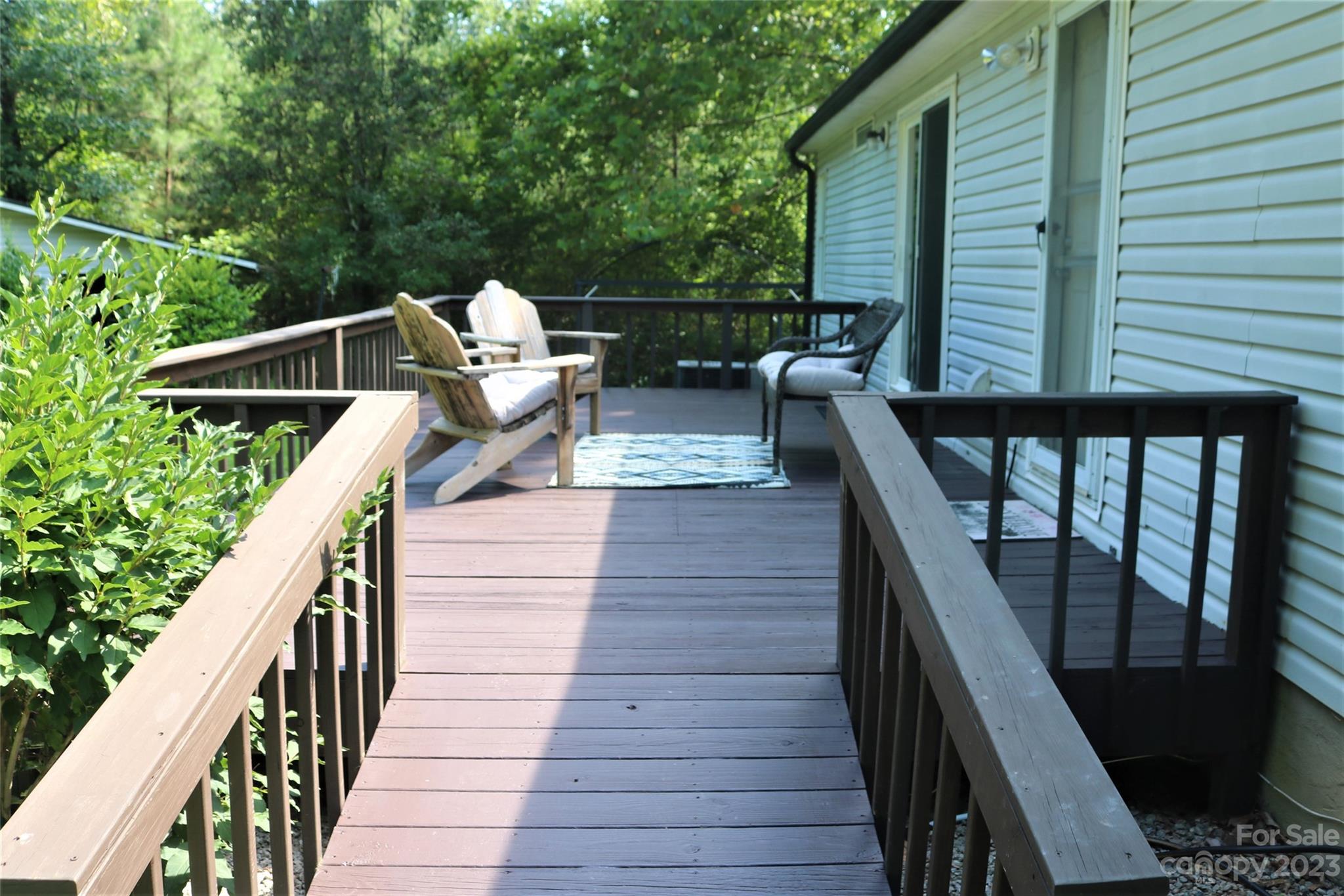 2919 Grassy Knob Road Mill Spring, NC 28756 - Photo 20 of 29 a view of deck with furniture and trees