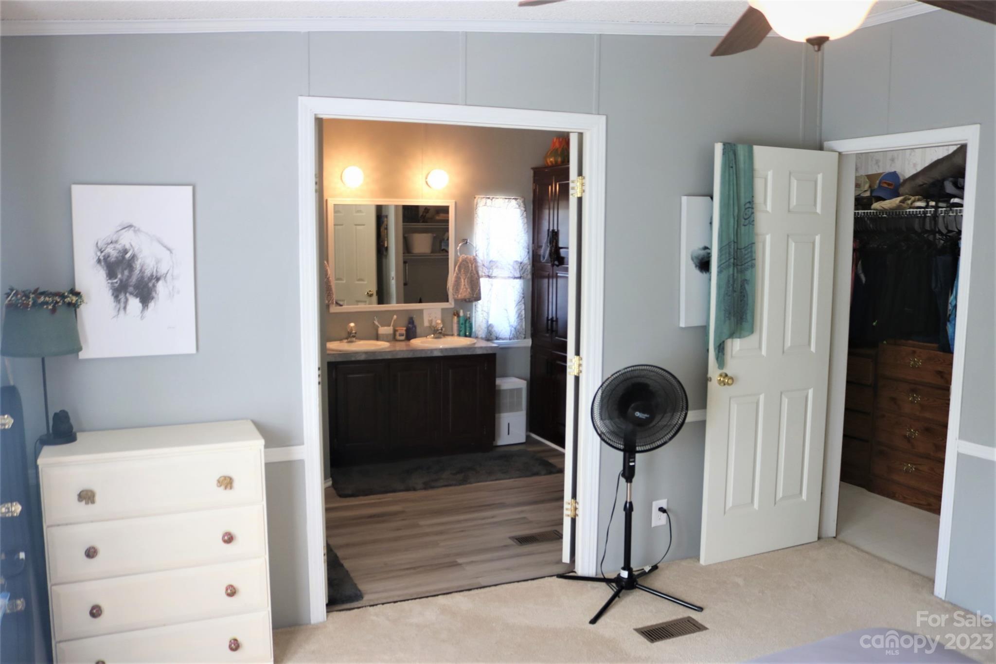 2919 Grassy Knob Road Mill Spring, NC 28756 - Photo 6 of 29 a view of a hallway with closet and mirror