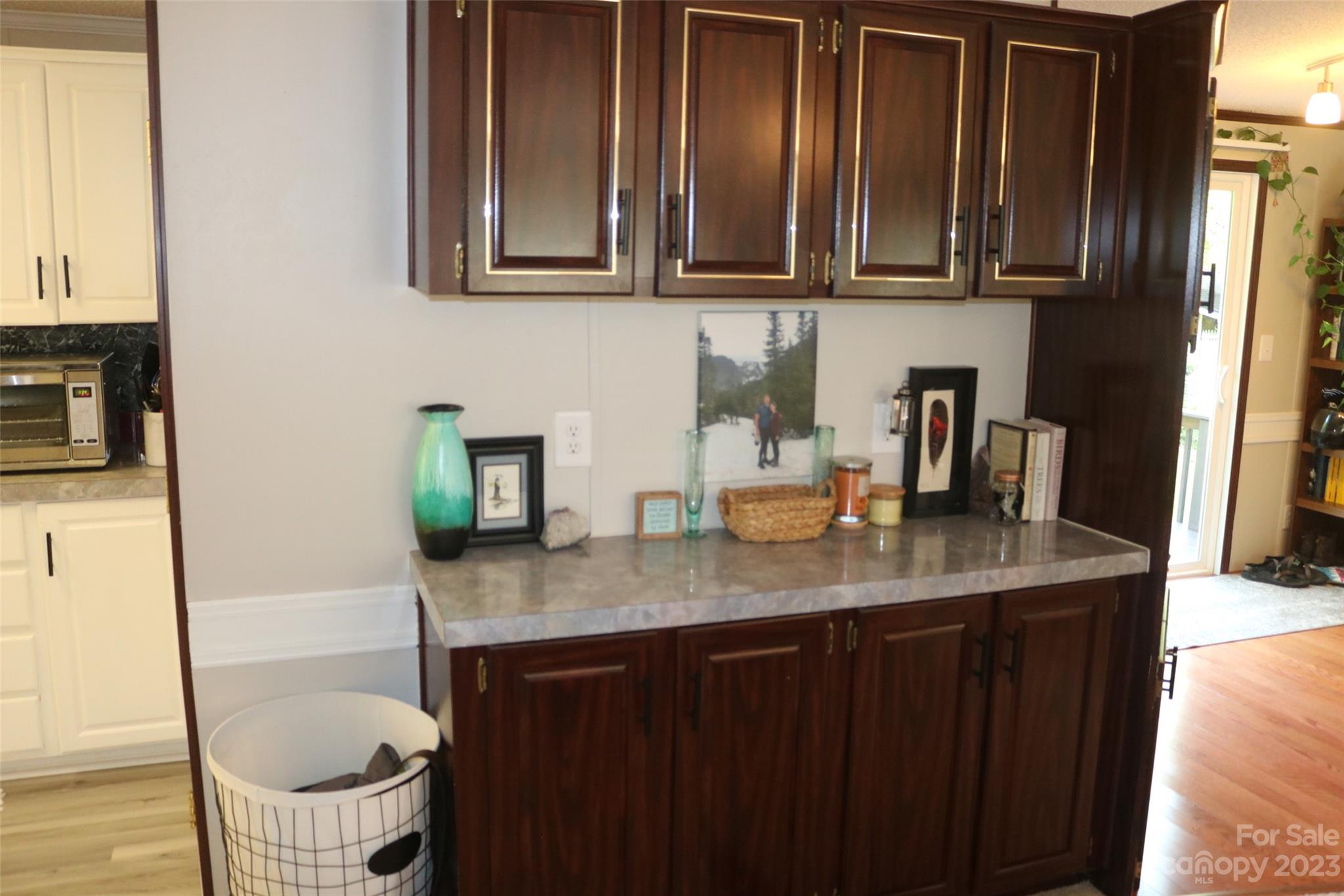 2919 Grassy Knob Road Mill Spring, NC 28756 - Photo 8 of 29 a bathroom with a granite countertop sink a toilet and bathtub