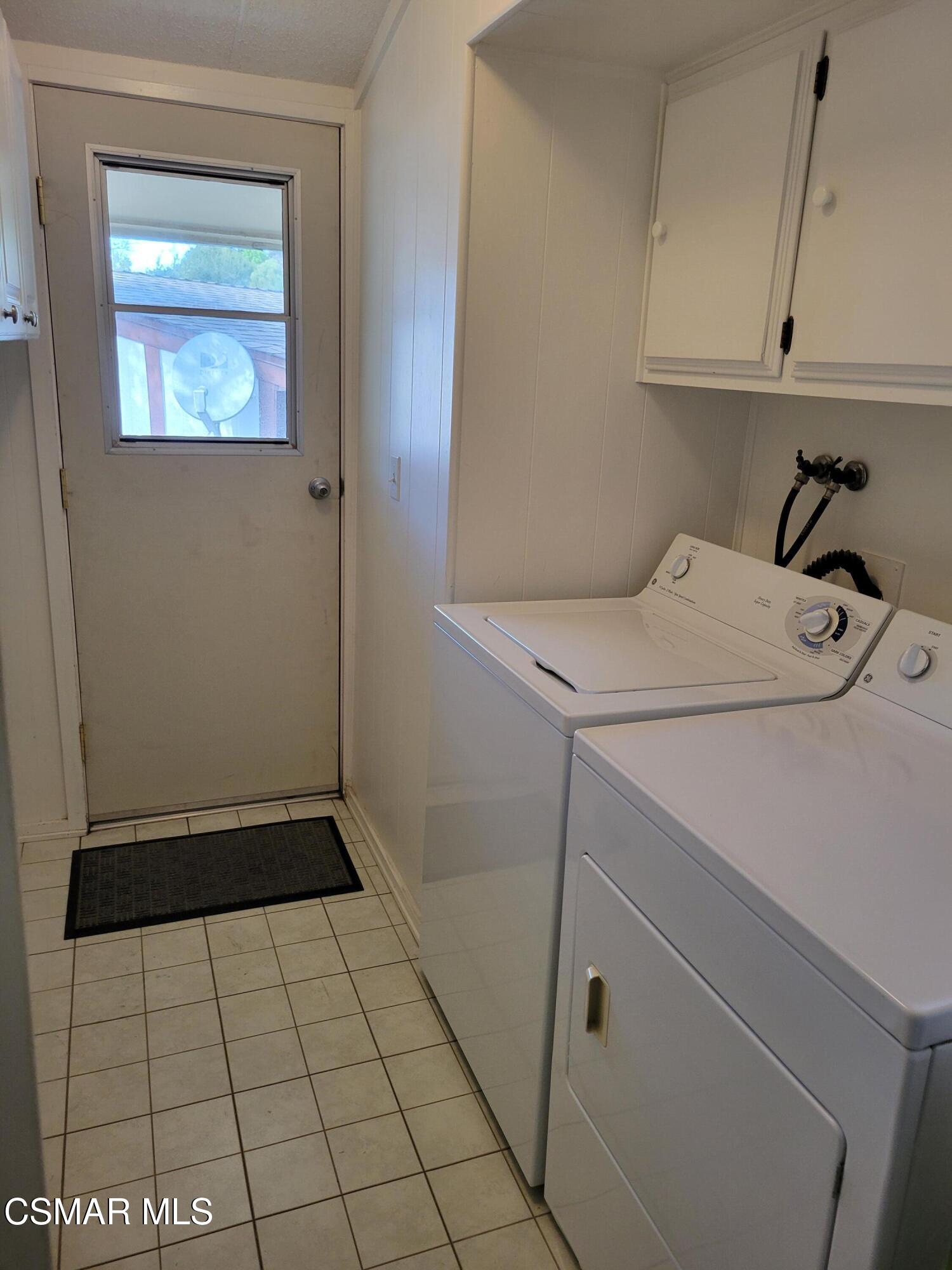 41 Old Castle Road Westlake Village, CA 91361 - Photo 7 of 13 a view of storage and utility room with washer and dryer