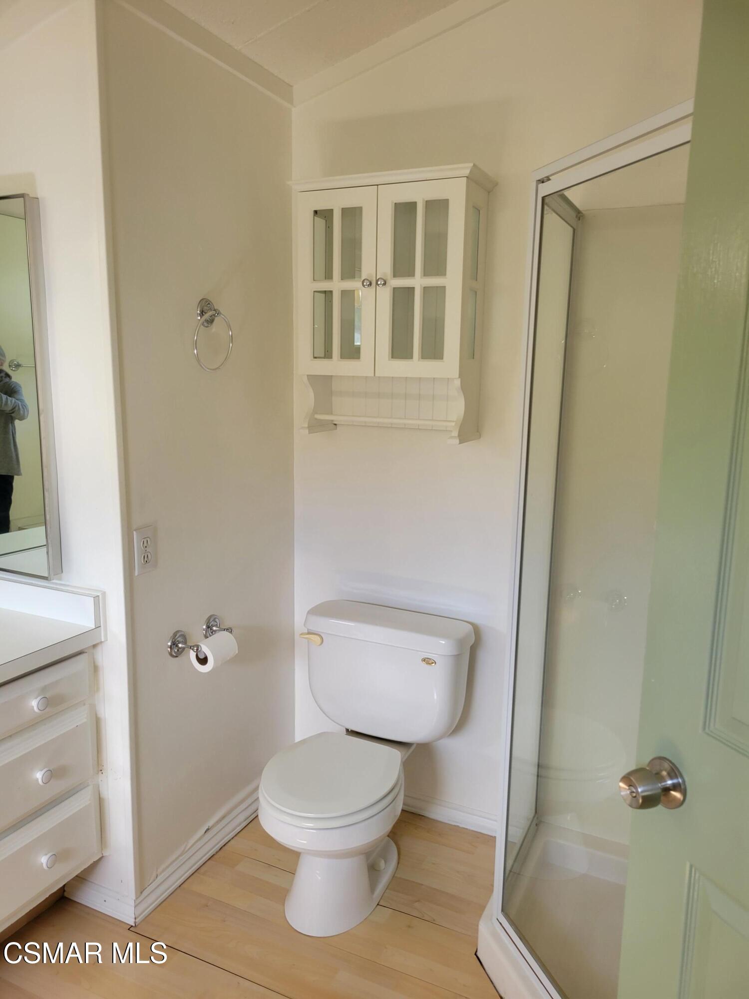 41 Old Castle Road Westlake Village, CA 91361 - Photo 9 of 13 a white toilet sitting next to a bathroom sink