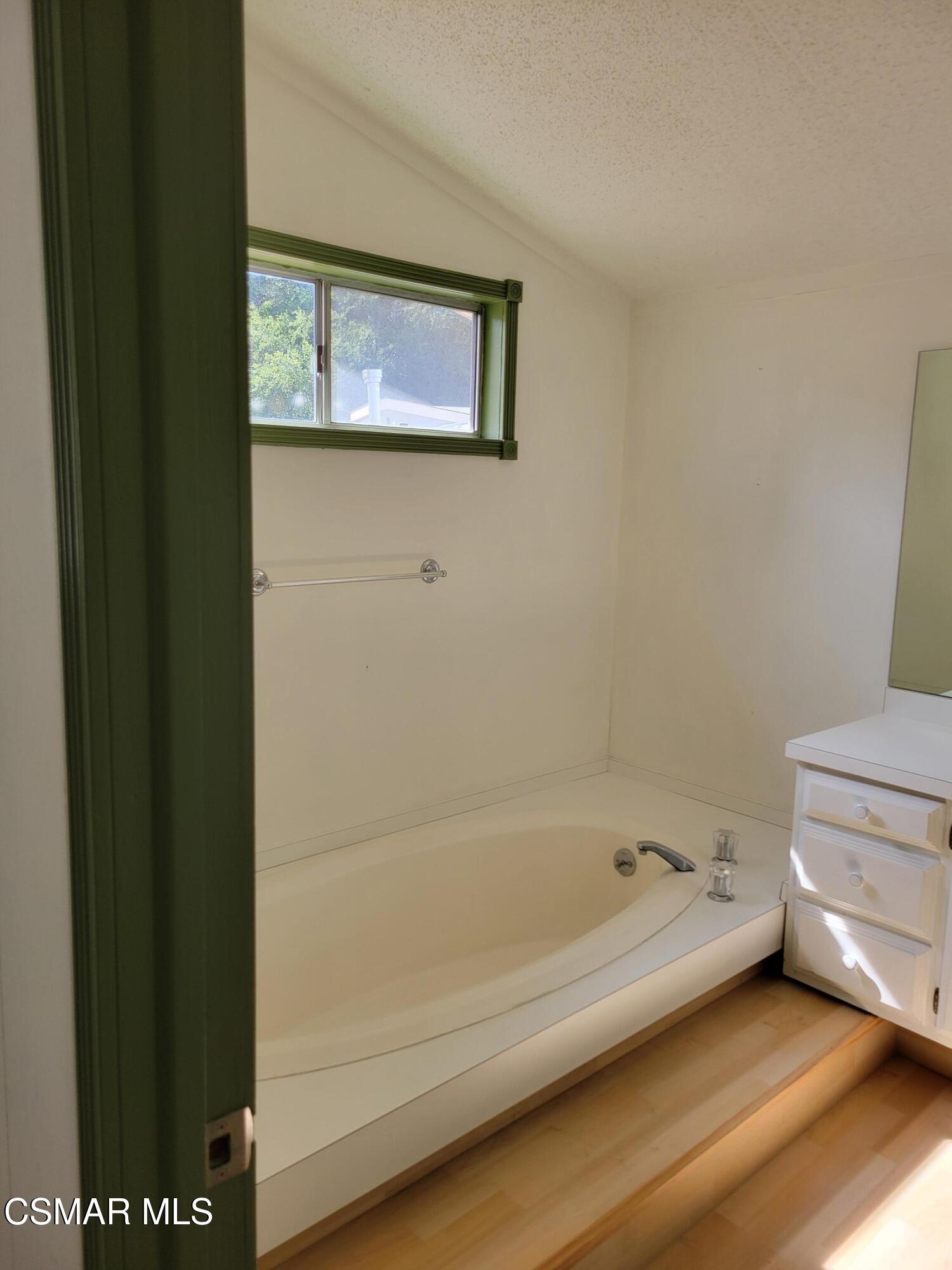 41 Old Castle Road Westlake Village, CA 91361 - Photo 10 of 13 a bathroom with a bathtub