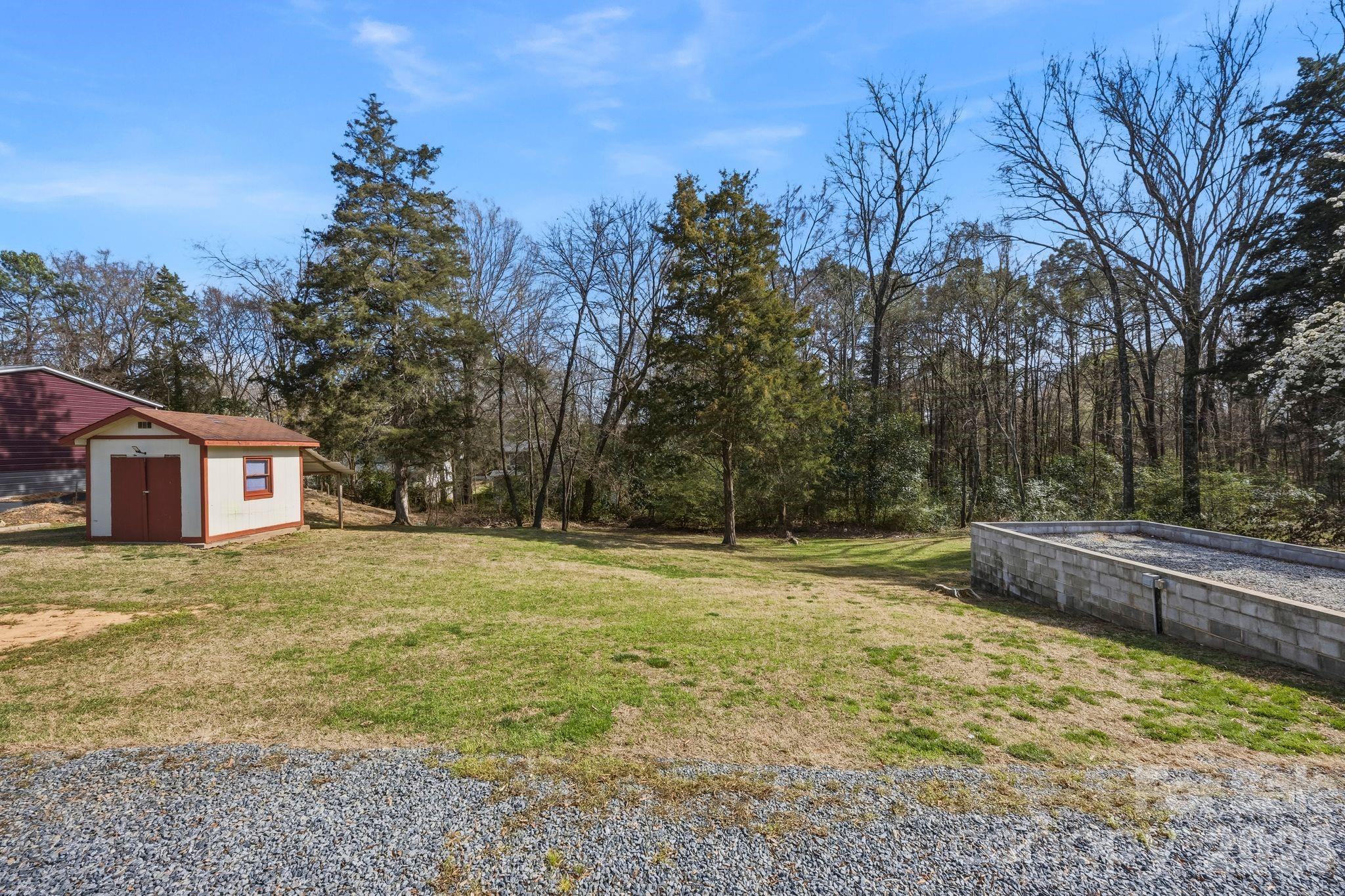 191 Fryling Avenue Southwest Concord, NC 28025 - Photo 23 of 25 a view of a yard with a house