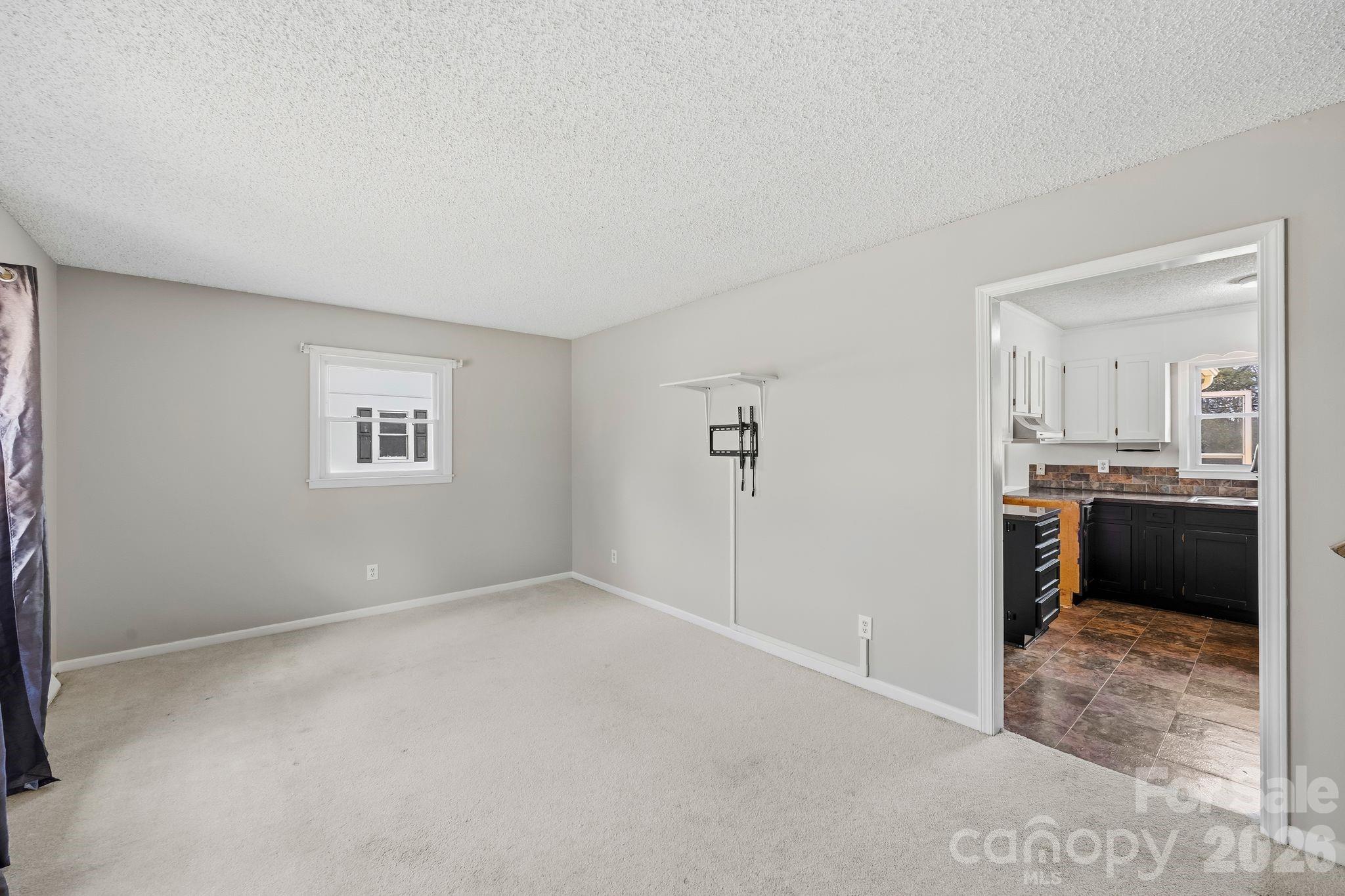 191 Fryling Avenue Southwest Concord, NC 28025 - Photo 7 of 25 a view of a kitchen and a window