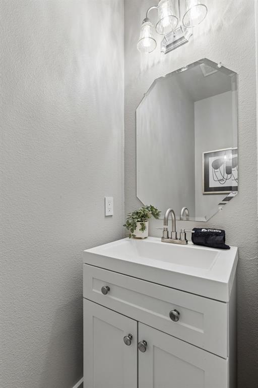 706 South Jupiter Road, Unit 307 Allen, TX 75002 - Photo 21 of 32 Powder room located downstairs