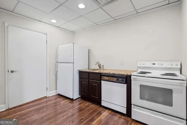 a view of balcony with wooden floor