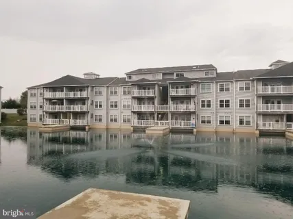 a view of a lake with a building