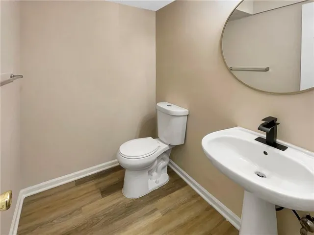 a bathroom with a toilet and sink