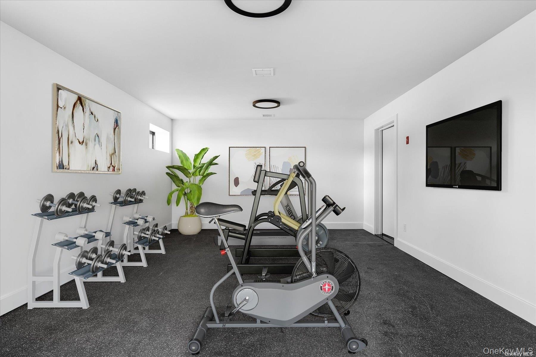 290 Windward Road Orient, NY 11957 - Photo 23 of 31 a view of a room with gym equipment