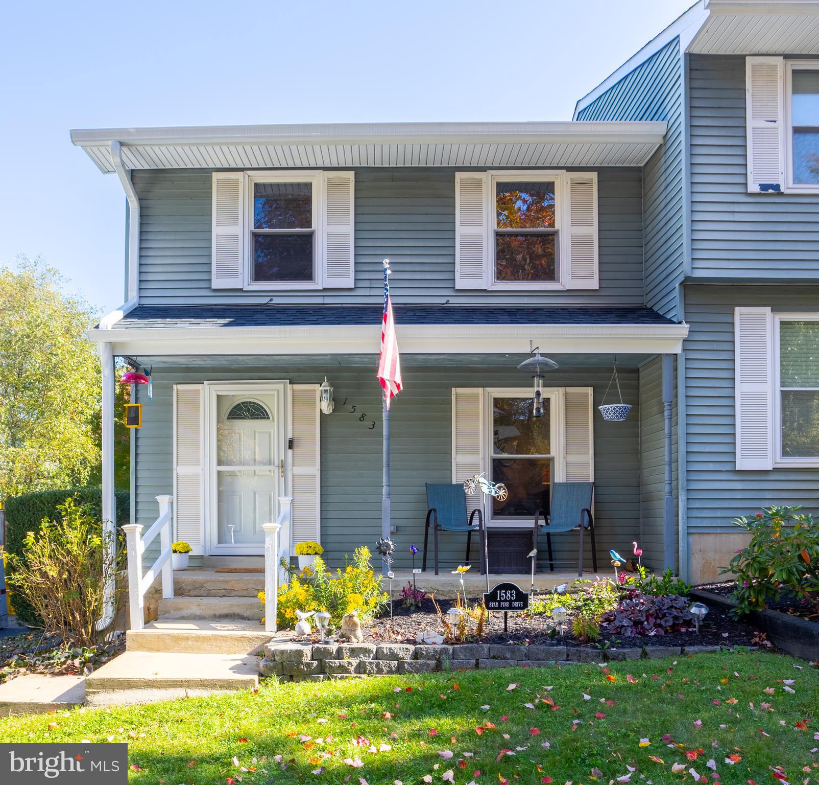 1583 Star Pine Drive Annapolis, MD 21409 - Photo 1 of 37 a front view of a house with garden