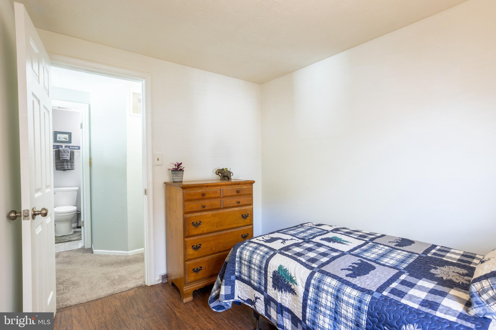 1583 Star Pine Drive Annapolis, MD 21409 - Photo 19 of 37 a bedroom with a bed and a closet