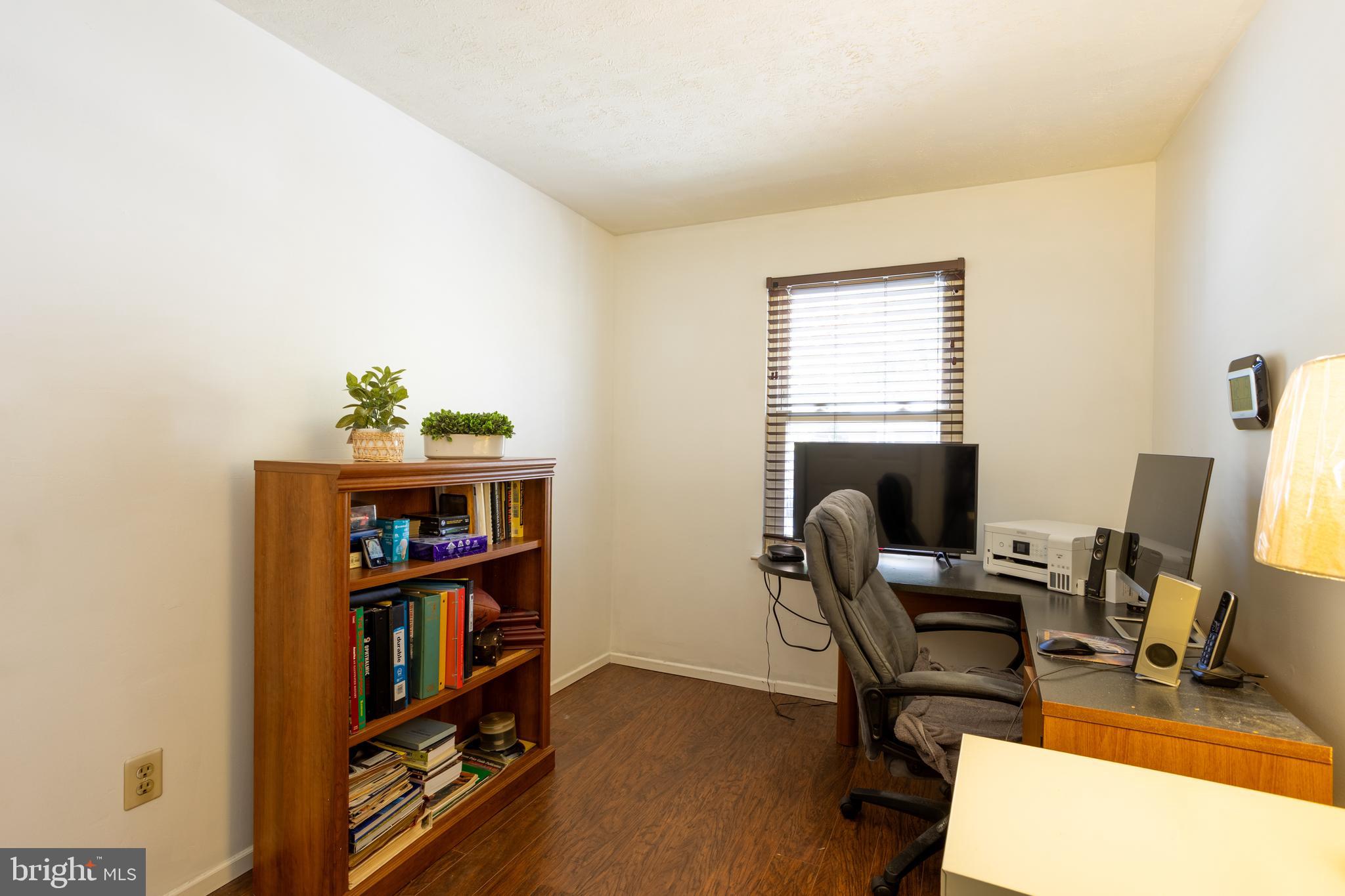 1583 Star Pine Drive Annapolis, MD 21409 - Photo 21 of 37 a view of a workspace with furniture and a window