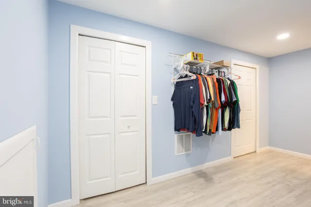 a bathroom with a shower and a toilet