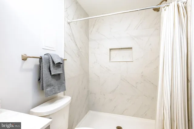 a view of a room with walk in closet and a window