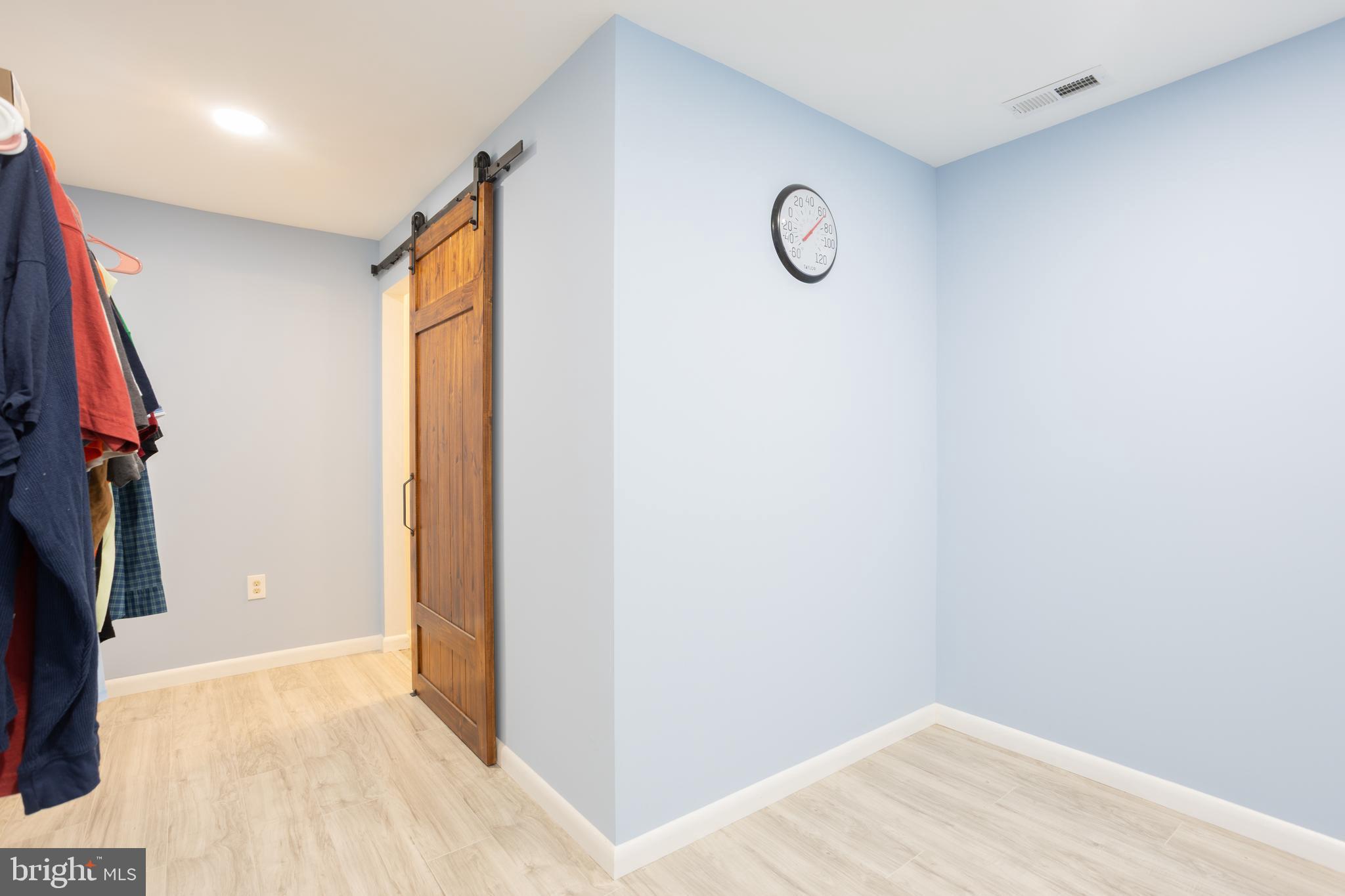 1583 Star Pine Drive Annapolis, MD 21409 - Photo 26 of 37 a view of a room with walk in closet and a window