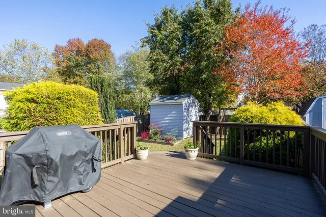 a view of a backyard with sitting area