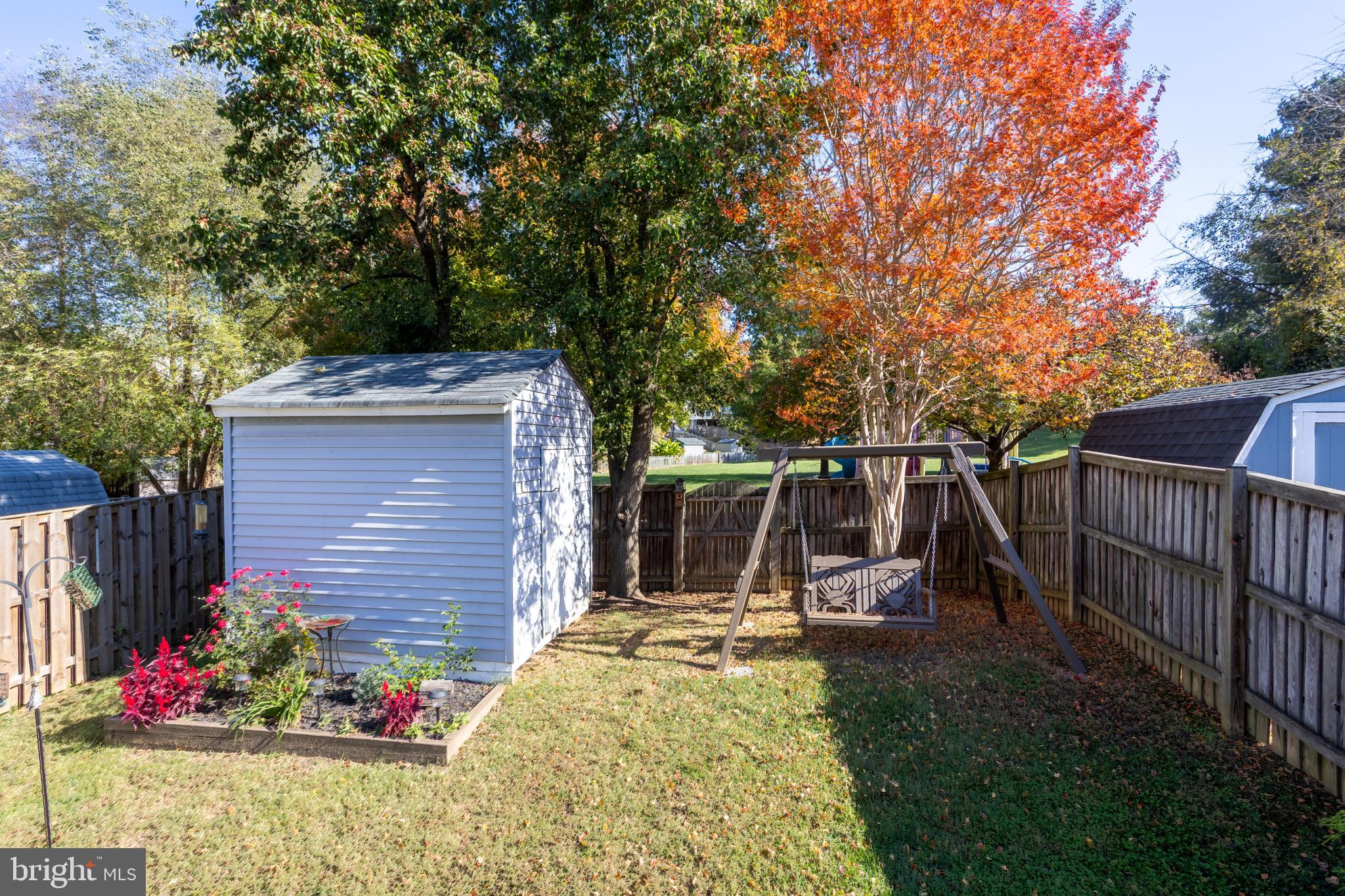 1583 Star Pine Drive Annapolis, MD 21409 - Photo 37 of 37 a view of a chair and table in the backyard
