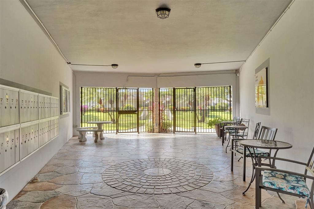 3405 Northwest 48th Avenue, Unit 611 Lauderdale Lakes, FL 33319 - Photo 33 of 34 a view of a room with furniture and large windows