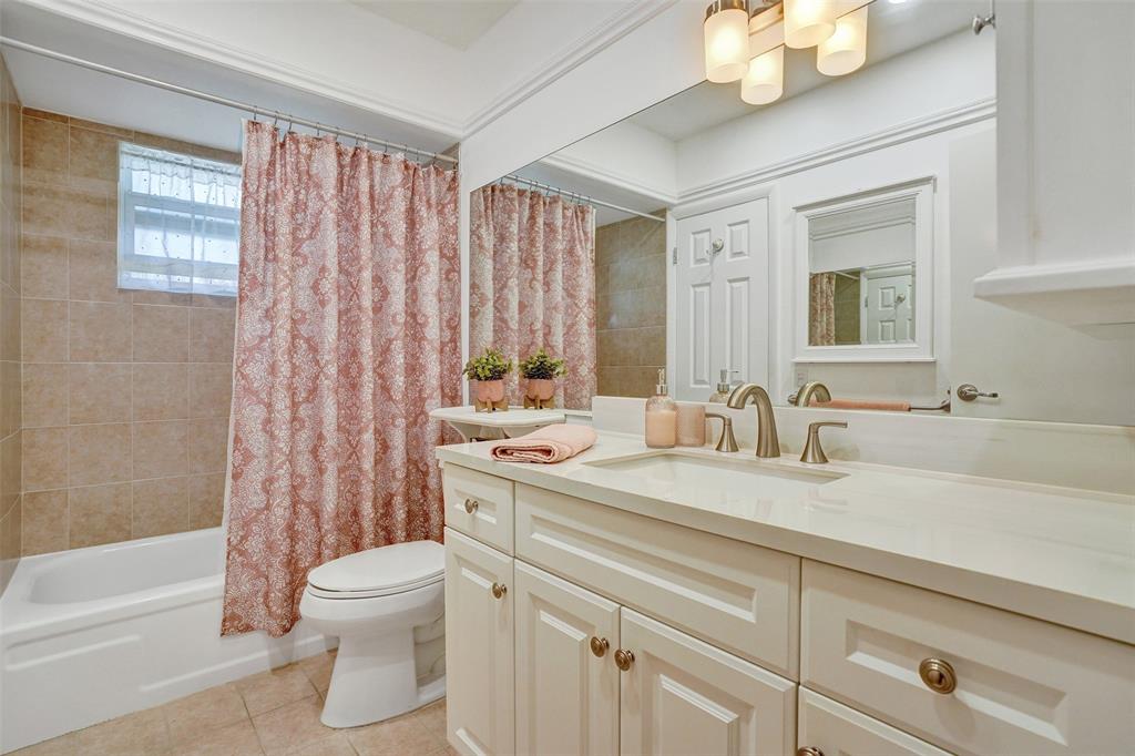 3405 Northwest 48th Avenue, Unit 611 Lauderdale Lakes, FL 33319 - Photo 7 of 34 a bathroom with a sink a toilet and shower