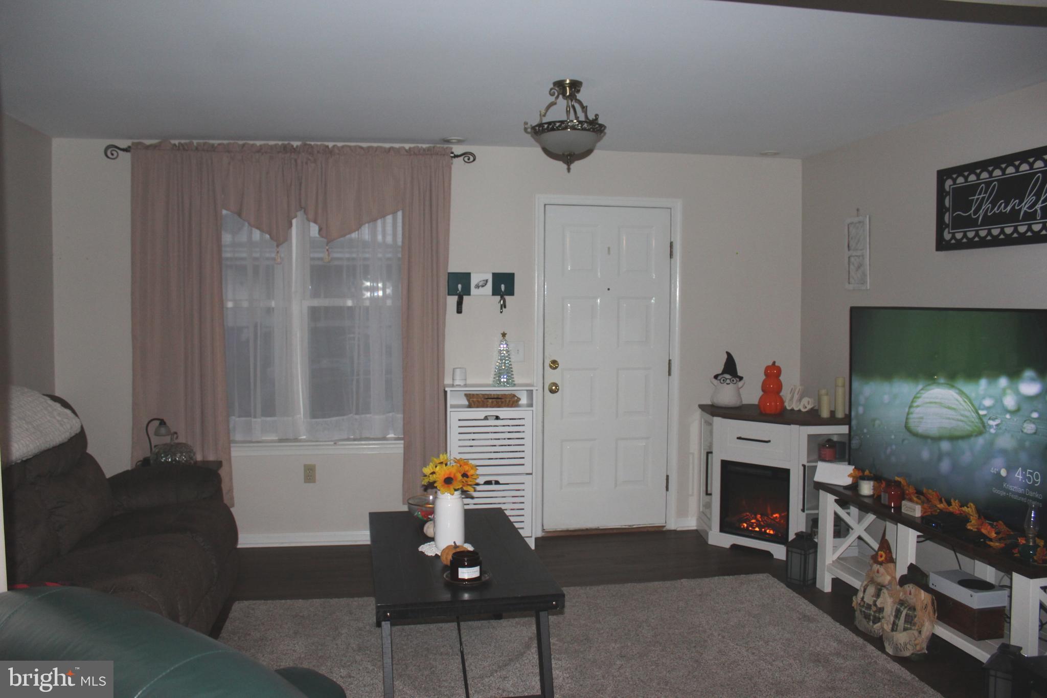 320 South Mill Street St. Clair, PA 17970 - Photo 13 of 37 a living room with furniture and a fireplace