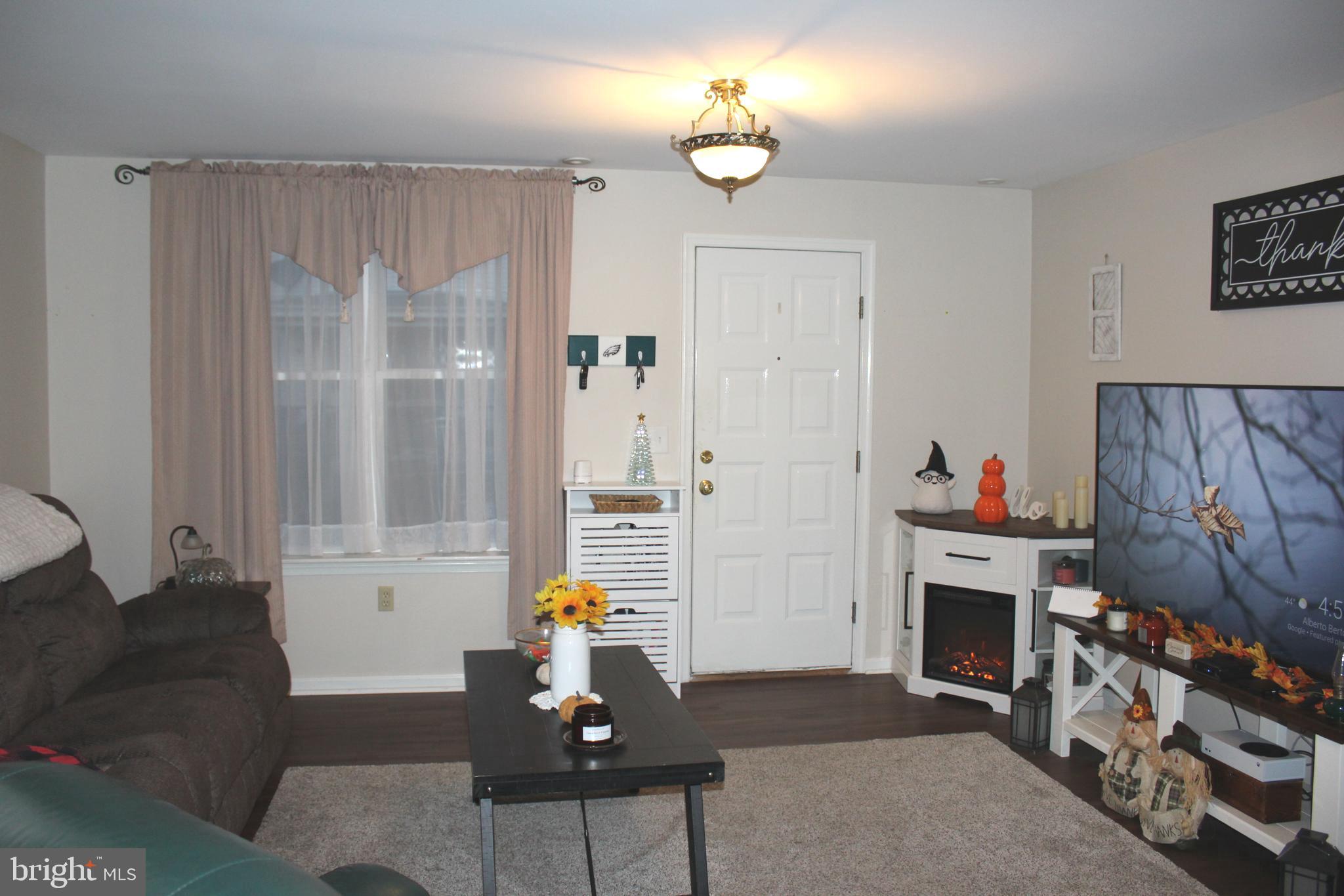 320 South Mill Street St. Clair, PA 17970 - Photo 14 of 37 a living room with furniture and a fireplace