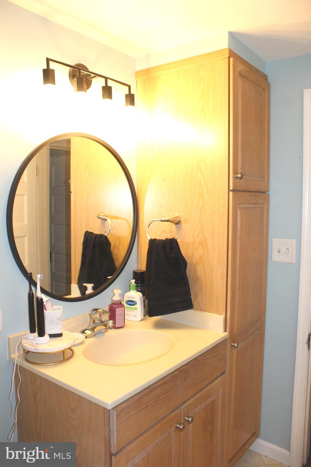 320 South Mill Street St. Clair, PA 17970 - Photo 22 of 37 a bathroom with a sink and a mirror