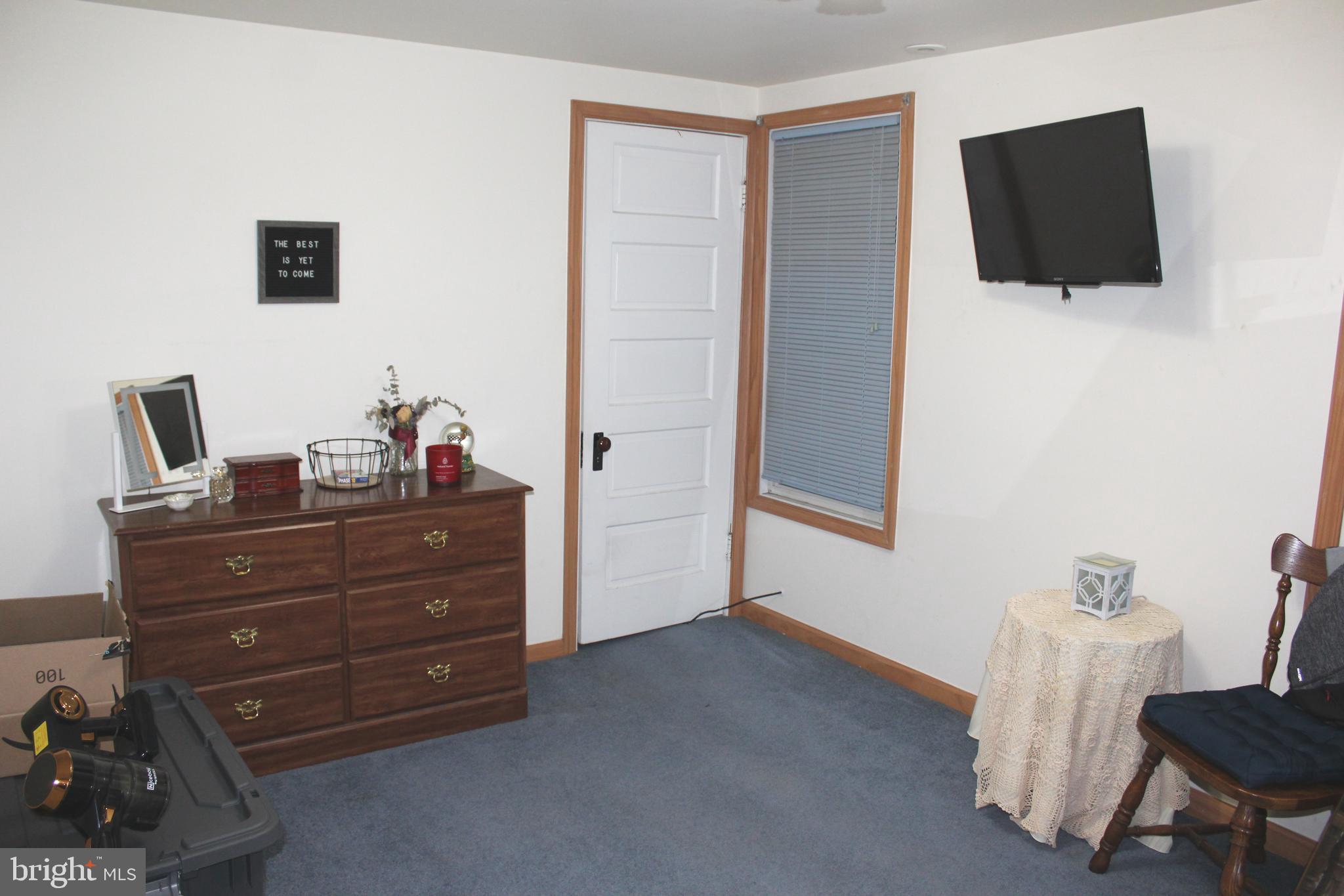 320 South Mill Street St. Clair, PA 17970 - Photo 25 of 37 a room with a bed and television