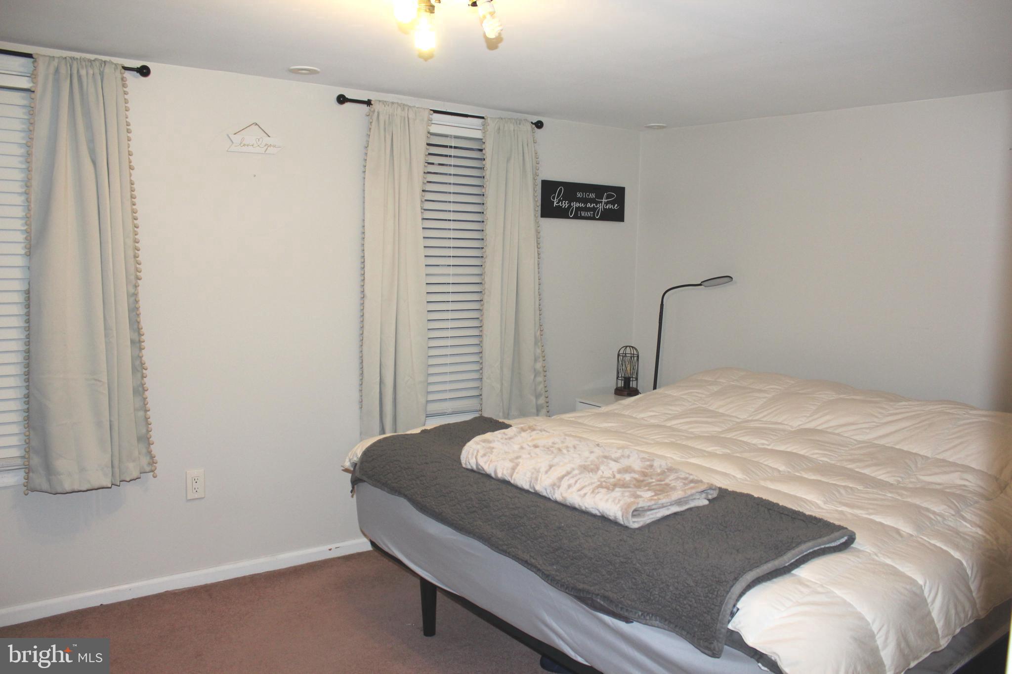 320 South Mill Street St. Clair, PA 17970 - Photo 28 of 37 a bedroom with a bed and a dresser