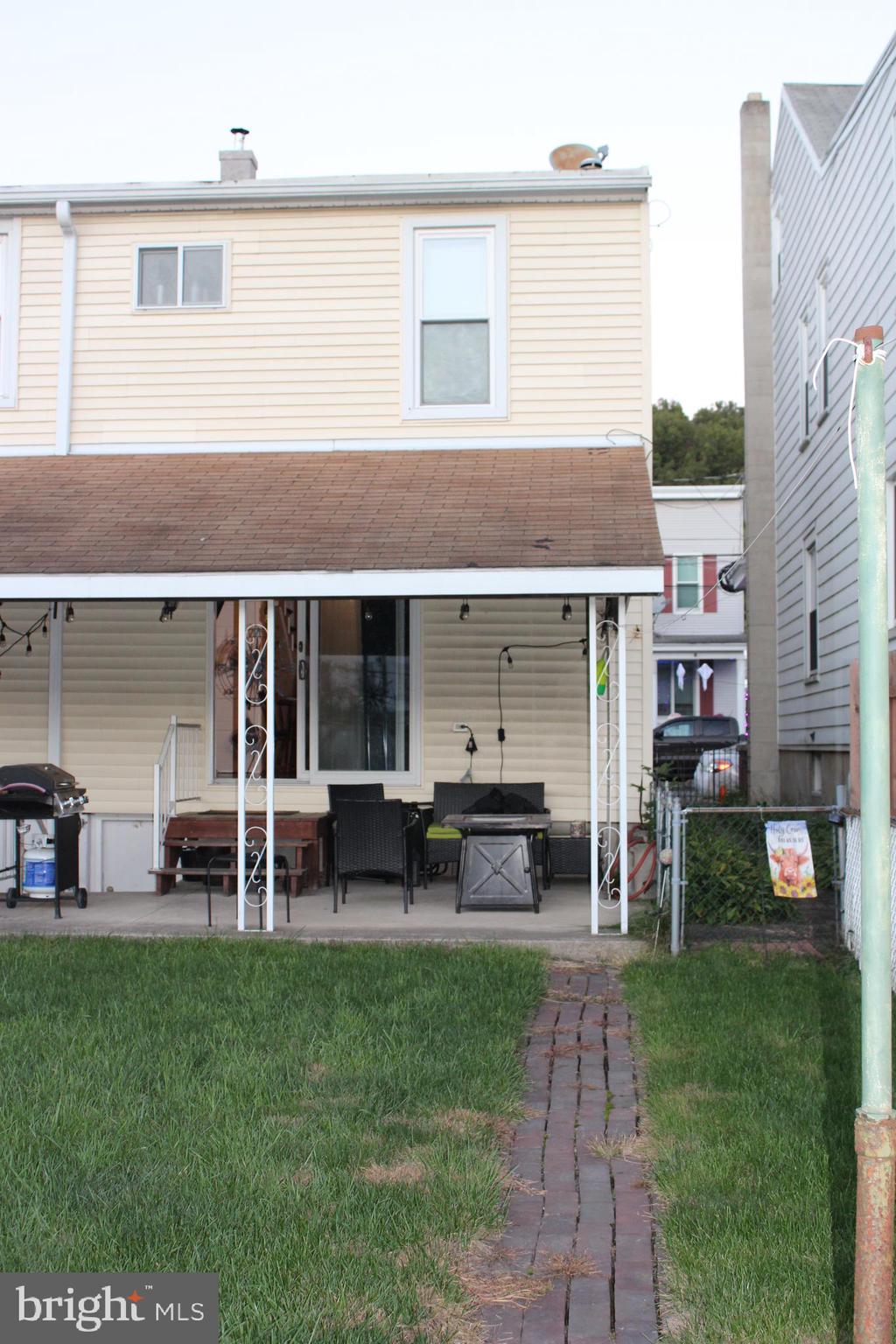 320 South Mill Street St. Clair, PA 17970 - Photo 3 of 37 a view of a house with a yard and sitting area