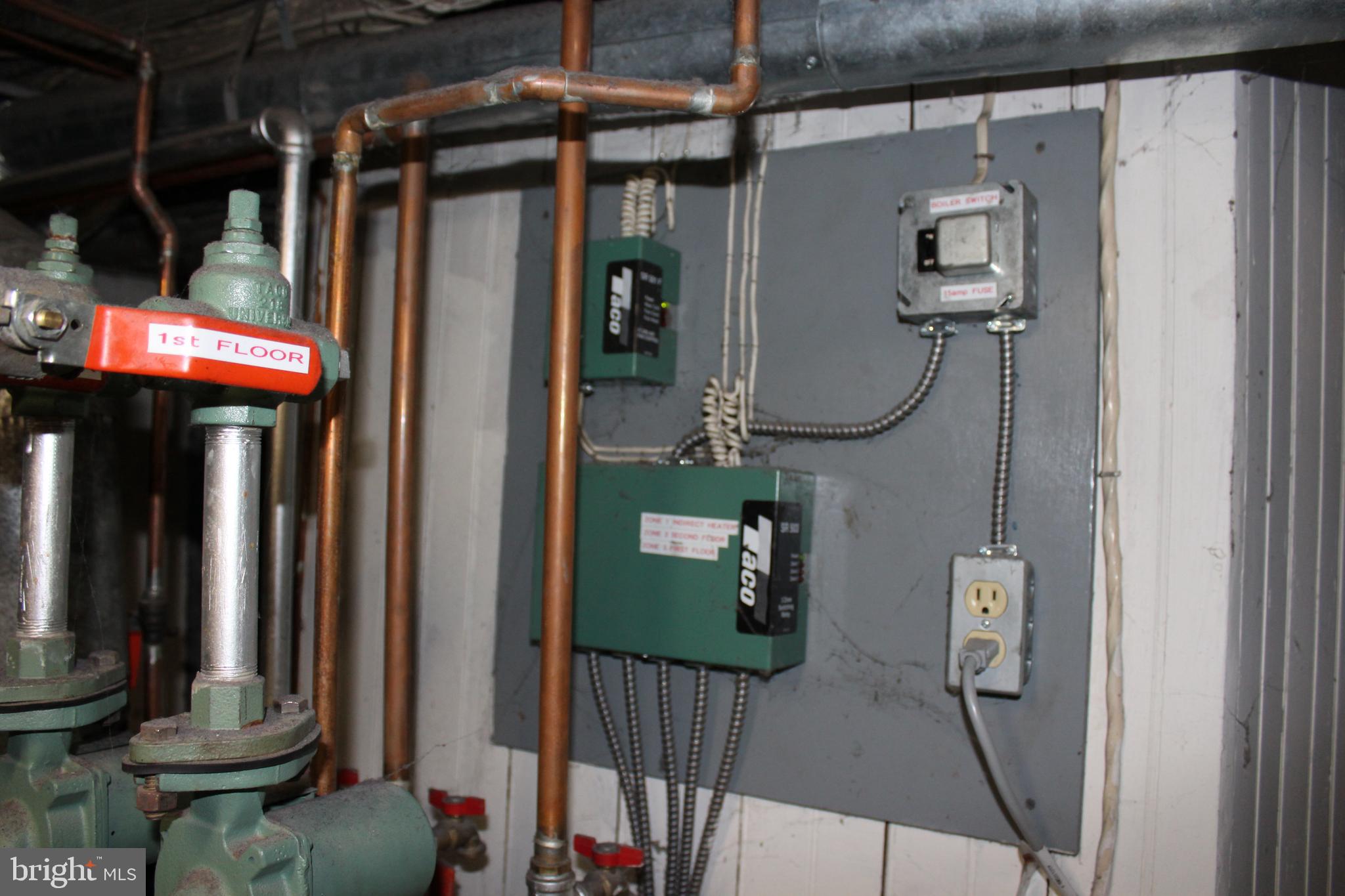 320 South Mill Street St. Clair, PA 17970 - Photo 35 of 37 a view of a brick building with a bench in front of building