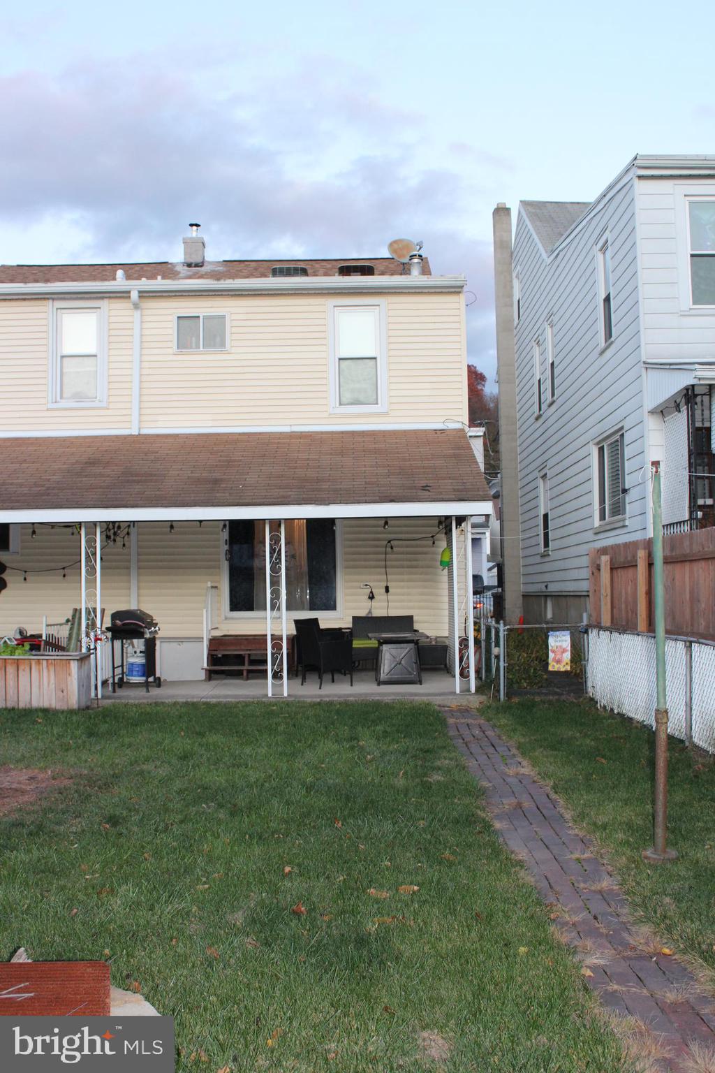 320 South Mill Street St. Clair, PA 17970 - Photo 6 of 37 a view of a house with a yard and sitting area