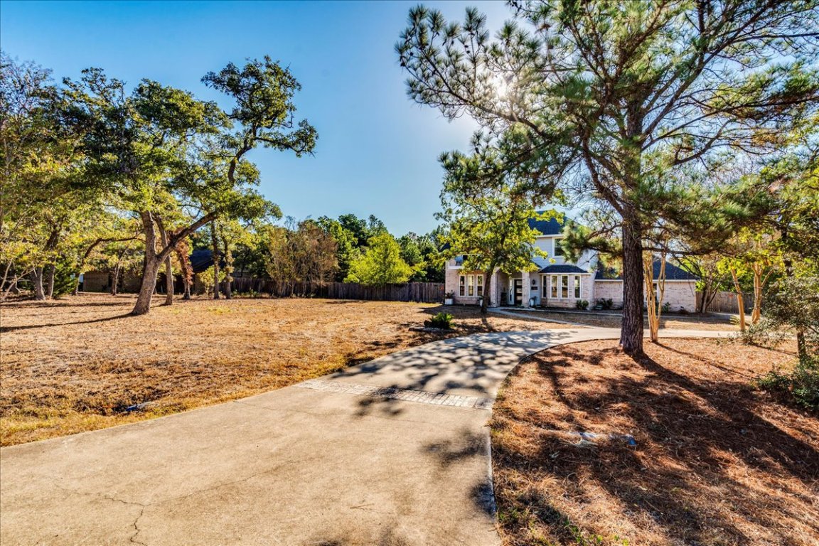 171 Pin Oak Crossing Elgin, TX 78621 - Photo 4 of 32 Extended driveway, tons of parking options