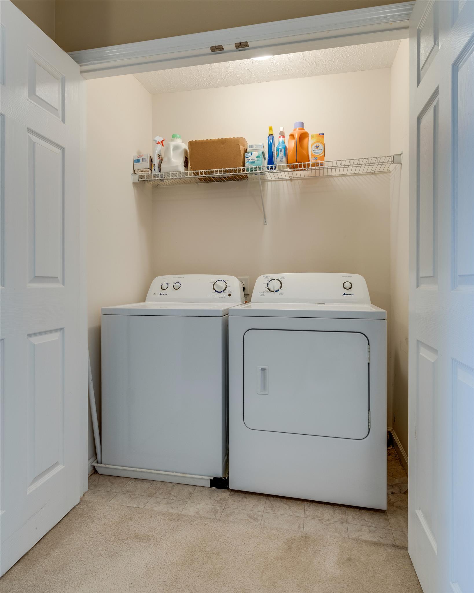 8215 Rossi Road Brentwood, TN 37027 - Photo 22 of 26 a utility room with dryer and washer